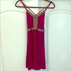 Raspberry dress with black and white design